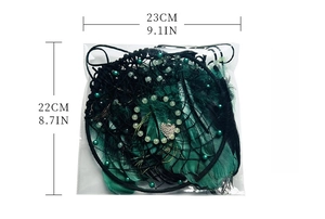 Peacock feather dreamcatcher with heart pendant and green beads packaging display