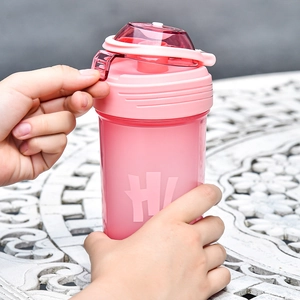 Pink fitness shaker bottle with leak-proof lid mechanism and embossed Hi design