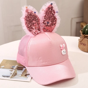 Pink girl baseball cap detail with sequined bunny ears and breathable mesh fabric
