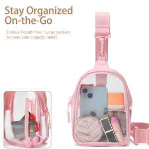 Pink transparent PVC crossbody bag with large pockets showing items and back zip pocket