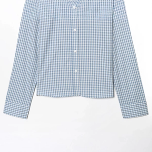 Slim fit blue plaid long sleeve shirt for women featuring a button-down design on white