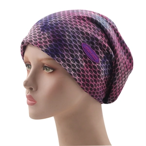 Winter knitted beanie featuring a purple gradient honeycomb texture and logo detail