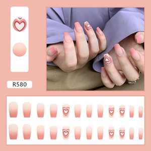 Matte pink gradient ballet press-on nails with red heart patterns and full 24-piece set