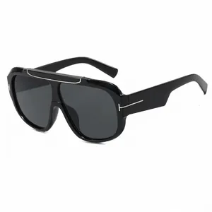Black oversized aviator sunglasses with silver bridge and T-shaped metal hinges