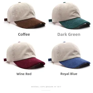 Detailed grid of corduroy baseball caps in coffee, dark green, burgundy, and royal blue