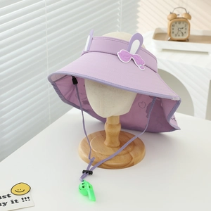 Detail of purple sun hat featuring rabbit ears, bow, wind rope, and a whistle charm
