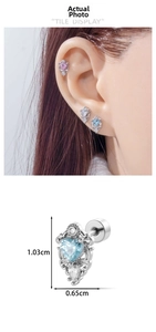 Detail view of heart-shaped zircon screw back earrings with dimensions and ear placement