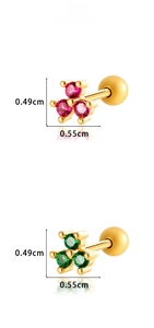 Macro detail of three-stone zircon cartilage stud earrings with screw back closure