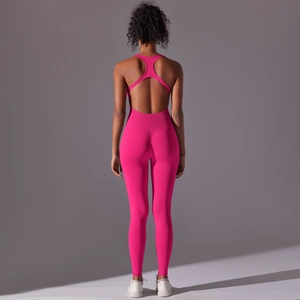 Close-up detail of backless yoga jumpsuit with criss-cross straps and ribbed knit texture