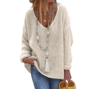 Close-up of beige V-neck long-sleeve knit sweater featuring a loose-fitting silhouette