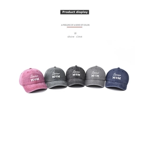 Detail view of washed cotton soccer mom baseball caps in five vintage colors