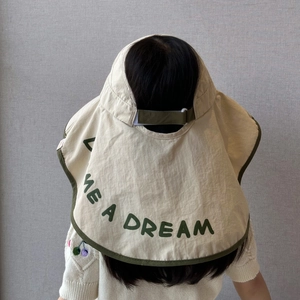 Rear view of kids sun hat with neck protection flap and GIVE ME A DREAM print detail