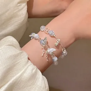 Double-layered beaded bracelet set with crystal beads and silver butterfly charms