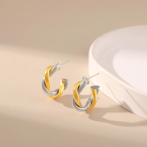Two-tone gold and silver twisted C-shaped earrings with hip hop style 18K plating