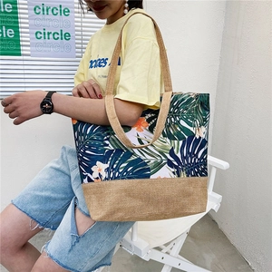 Canvas tote bag with green leaf print and large capacity for women beach use