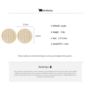 Detail view of round gold ripple acrylic earrings with 3.3cm size and 6.8g weight specs