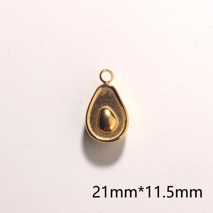 Macro shot of 18k gold plated avocado pendant measuring 21mm by 11.5mm on white backdrop