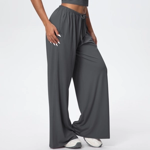 Detail view of charcoal gray high-waisted wide-leg sweatpants with drawstring and pockets