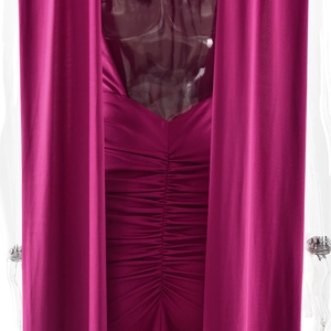 Detail view of ruched back design and draped fabric on fuchsia sleeveless evening gown