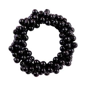 Close-up of elastic hair tie made with glossy black beads for elegant ponytail styling