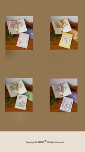 Detail showing 3D pop-up floral greeting cards with matching envelopes and unique designs