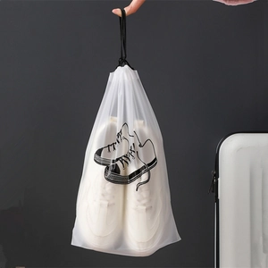 Frosted waterproof drawstring travel shoe bag with sneaker graphic and white sports shoes