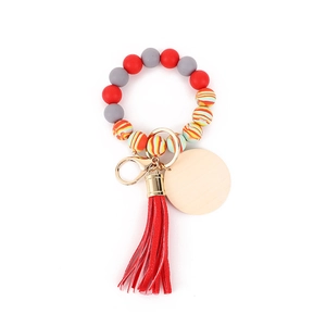 Silicone bead keychain bracelet with red leather tassel and natural wood ring charm