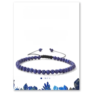 Lapis Lazuli 4mm beaded bracelet with adjustable black cord on informational display card