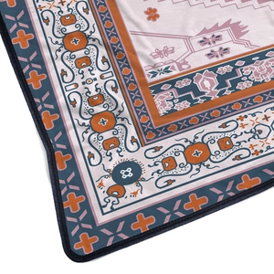 Macro shot of geometric ethnic pattern flannel blanket with durable black edge binding