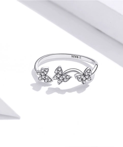 Close-up of S925 sterling silver butterfly ring with sparkling cubic zirconia inlay