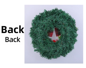 Detail view of the green pine needle Christmas wreath back with red plaid ribbon