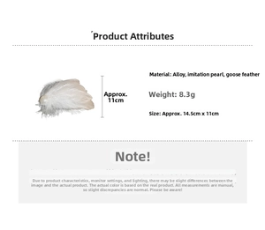 Detail showing dimensions of white feather hair clip with pearl on a plain background