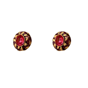 Vintage oval gold earrings with rose red crystal center and ornate relief texture