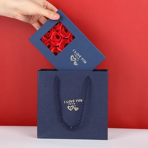 Blue jewelry gift set with red roses, matching tote bag and I Love You gold foil text