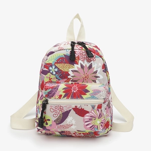 Cute floral print canvas backpack for girls with colorful flower patterns and white straps