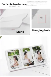 Close-up of triple folding white photo frame showing back support stand and wall hanging hole