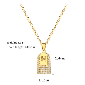 Detail of gold titanium H-letter pendant necklace showing dimensions and 4.3g weight
