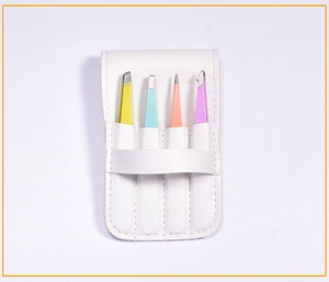 Detailed view of 4 colorful stainless steel tweezers in a white PU leather storage case