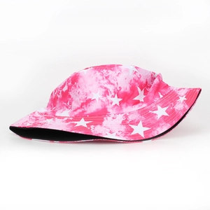 Detail of pink tie-dye bucket hat with white stars pattern and smooth black lining