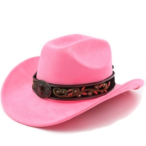 Close-up of pink suede western hat featuring ethnic embroidery and a gemstone buckle