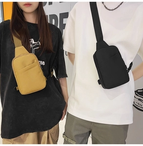 Dual view of yellow and black cross body bags on models showing size and fit