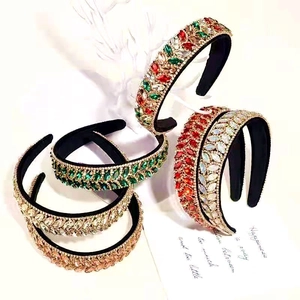 Macro detail of rhinestone leaf headbands with thick sponge padding in various colors