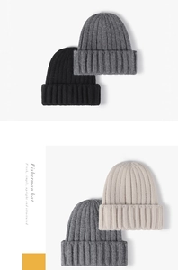 Vertical rib-knit fisherman hats in black, grey, and cream with a structured design