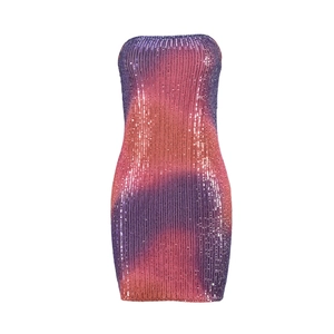 Detailed close-up of pink and orange gradient sequins on a strapless bodycon dress