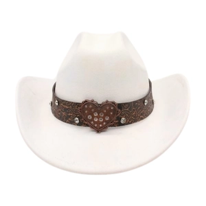 Close-up of white suede cowboy hat featuring vintage floral leather band and heart buckle