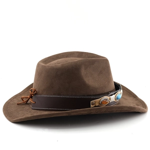 Detail of bohemian dark brown suede cowboy hat featuring turquoise stone leather band