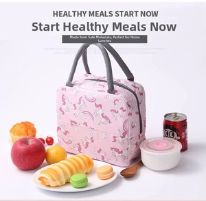 Pink insulated lunch bag with unicorn prints and top zipper for school and office