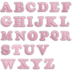 Set of 26 pink embroidered English alphabet patches with white borders for clothing