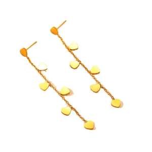 Elegant gold heart tassel earrings with dangling charms in a minimalist luxury style