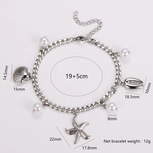 Silver ocean themed bracelet with starfish and shell charms, dimensions 19+5cm long